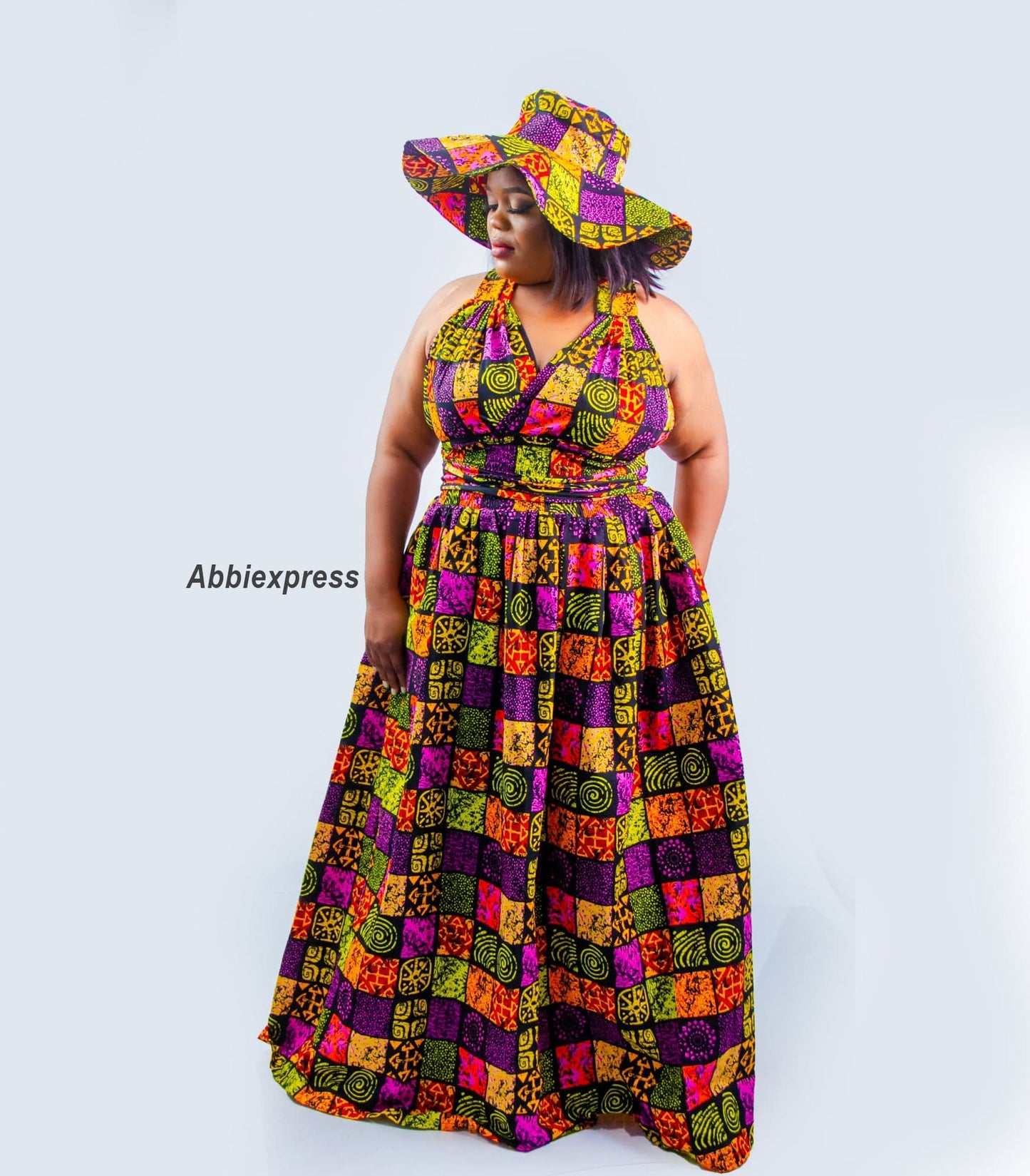 Abbiexpress AFRICAN WOMEN'S WEAR Multiple color Ankara Maxi dress paired with a matching hat.